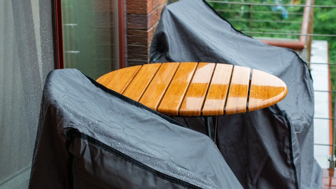 Exterior furniture with covers to protect during inclimate weather